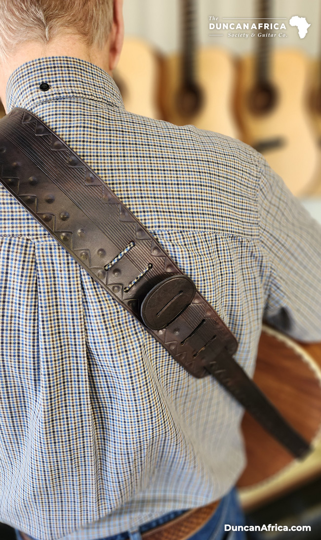 https://duncanafrica.com/wp-content/uploads/2023/03/custom-handmade-leather-guitar-strap-6.jpg
